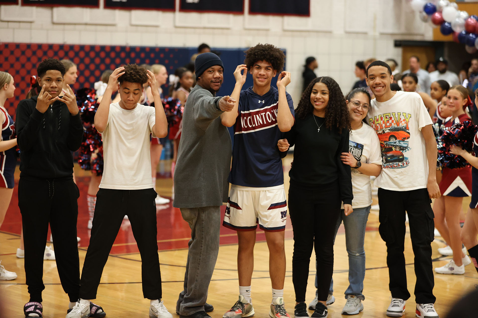 Xavier and his family posing the cameras