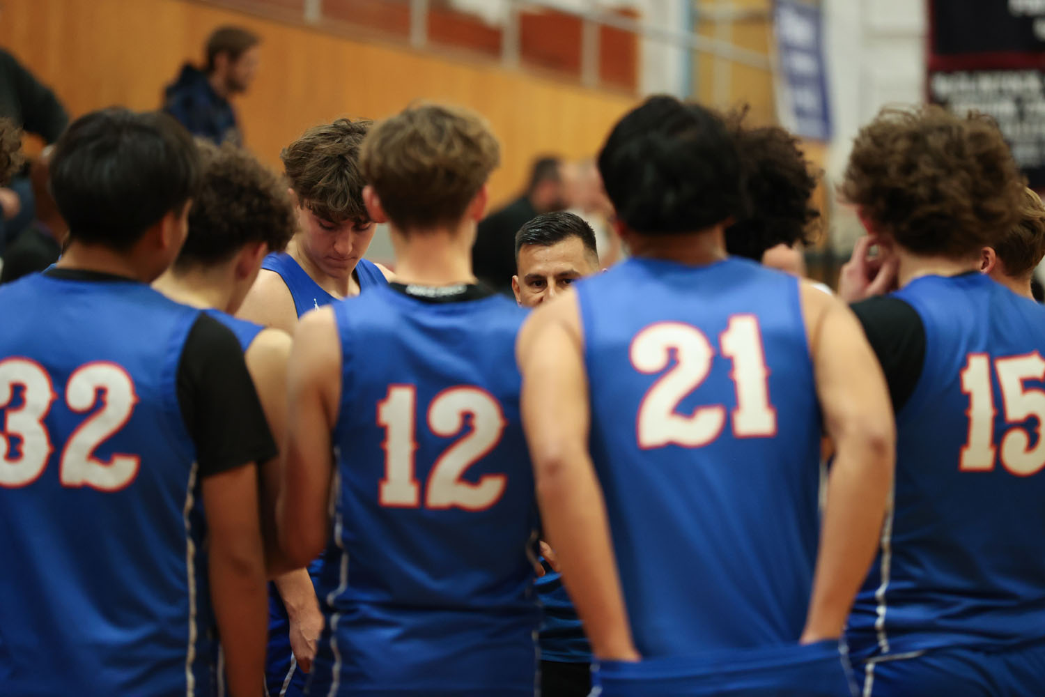 Coach coaching up his team