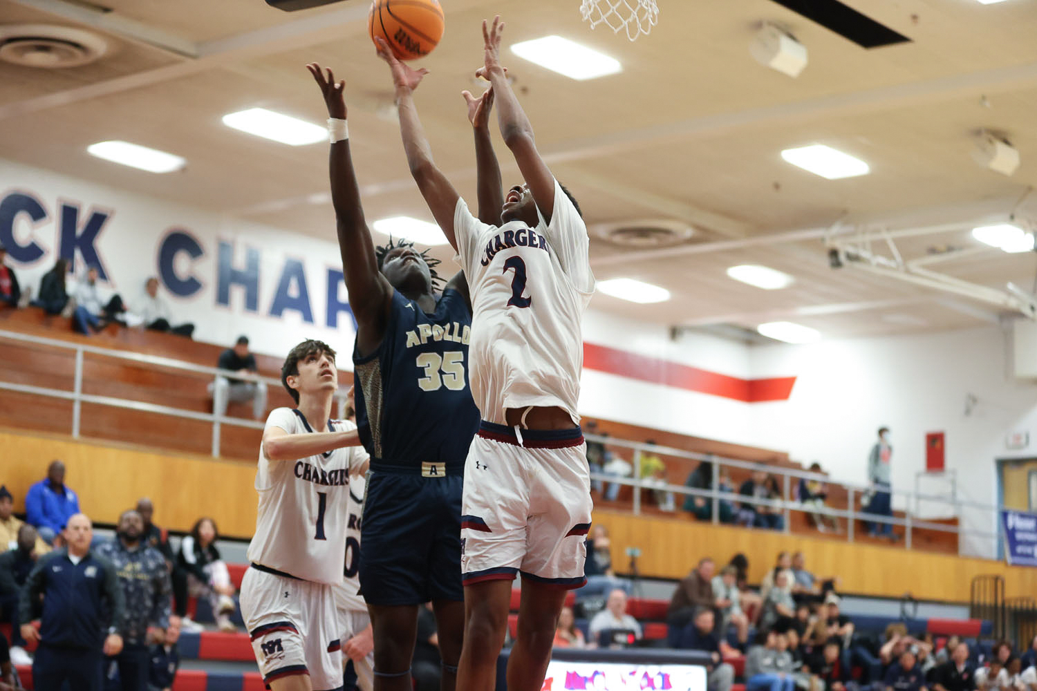 Both teams going up for the rebound